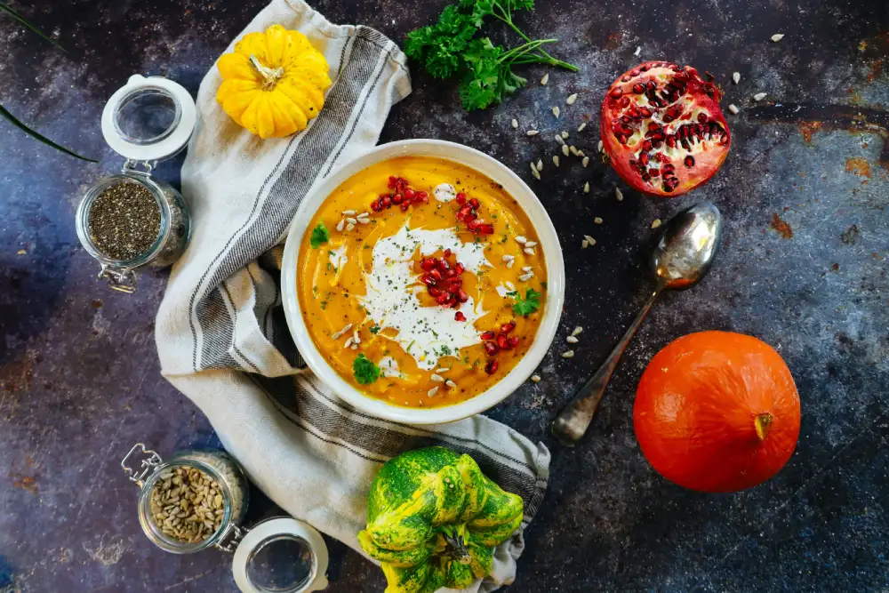 a bowl of soup with vegetables and spices for bedtime snack