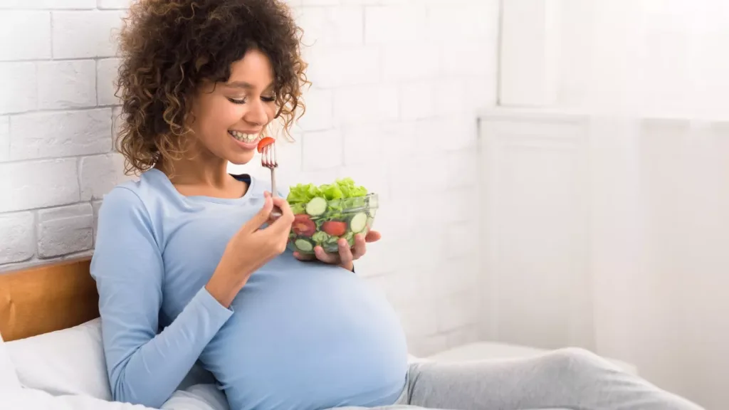 pregnant woman eating