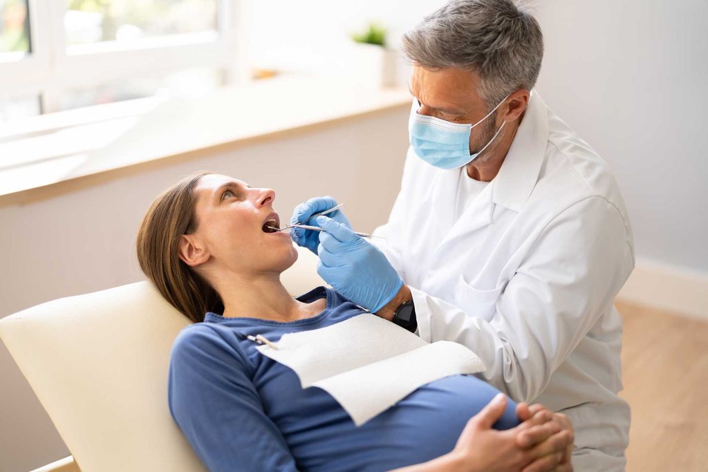 pregnant woman in dental clinic